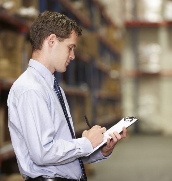 Manager In Warehouse With Clipboard Manager In Warehouse With Clipboard
