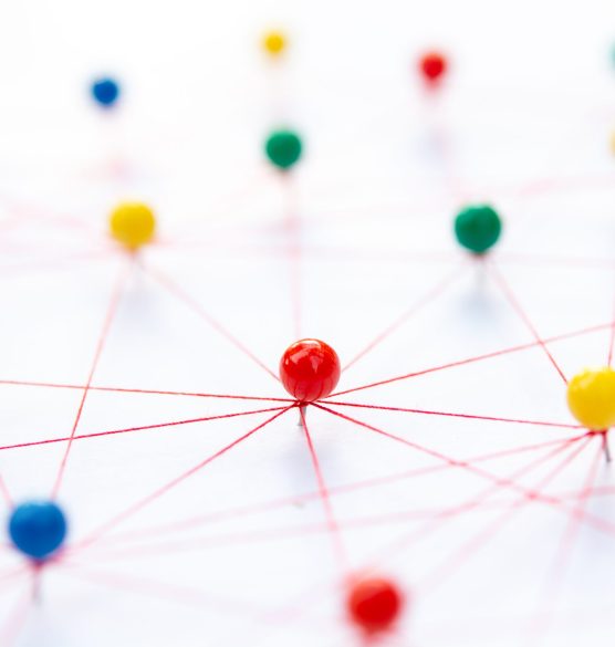 Linking entities, Blockchain, social media, Communications Netwo Linking entities, Blockchain, social media, Communications Network, The connection between the two networks. Network simulation on paper linked together by yarn